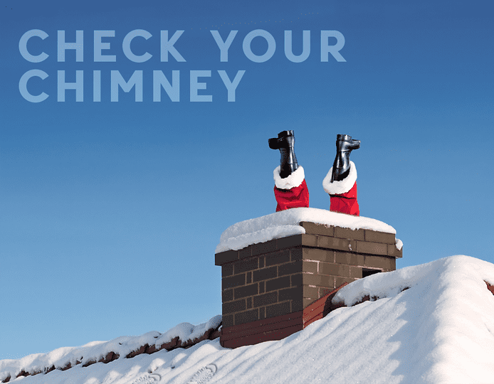 Santa Claus falling down a chimney